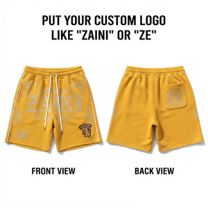 Shorts de basketball premium 100% polyester à motif de monstres de dessins animés, jaune et blanc avec ourlet contrastant, broderie de logo personnalisée, appliqué - Product Image 1