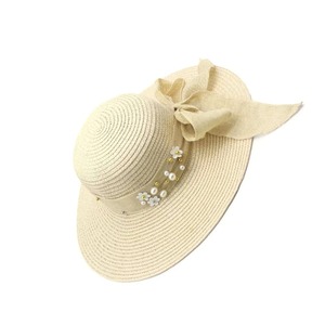 หมวกสานผู้หญิงปีกกว้าง ป้องกันแสงแดดในฤดูร้อน ประดับโบว์ริบบิ้นและมุก ดีไซน์หรูหรา เหมาะสำหรับวันหยุดพักผ่อนริมชายหาด น้ำหนักเบา แฟชั่นเก๋ไก๋ - Product Image 2