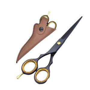 Tijeras de peluquero de color negro con logotipo personalizado, 6 pulgadas, profesional, de acero inoxidable, de alta calidad - Product Image 1