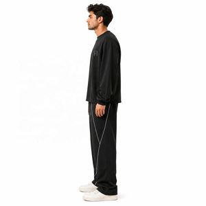 Ensemble de survêtement unisexe d'hiver en coton tricoté 100 %, comprenant un sweat à capuche oversize et un pantalon de jogging à jambe large avec passepoil contrastant, coupe décontractée - Product Image 4