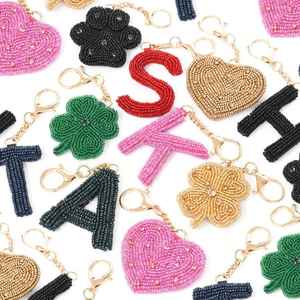 Custom <b>Alphabet</b> Seed <b>Bead</b> Keychain Gold Alloy Ring Letter Initial Bag Charm Heart Clover Shape Embroidery Wholesale Pendant - Product Image 1