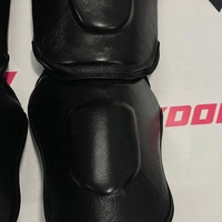 Protège-tibias de boxe et de kickboxing en cuir de vachette véritable Fairtex, nouveau design, avec logo personnalisé, vente en gros, pour entraînement Muay Thai