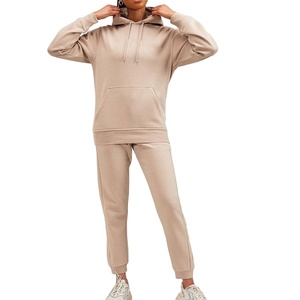 2024 nueva llegada brillante chándal de invierno hombres mujeres Top Trending mejor calidad a prueba de viento conjuntos de moda promocionales - Product Image 1