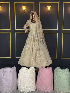 Designer Net Lehenga Choli avec LX Front Cut Heavy Dori Work et Full Jarkan Stone Broderie Disponible en 5 Couleurs - Product Image 4