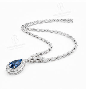 Elegant pendant <b>necklace</b> in 18K white gold with pear cut blue sapphire centerpiece classic halo of sparkling lab grown diamonds - Product Image 6