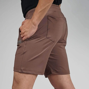 Men's <b>Black</b> Solid Quick Dry Breathable Sport Shorts Elastic Waist Knee Length Nonwoven Polyester Front Logo Drawstring Closure - Product Image 3