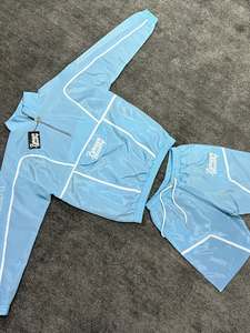 ชุดเซ็ตเสื้อแจ็คเก็ตและกางเกงขาสั้นไนลอน 2 ชิ้นสำหรับผู้ชาย รุ่นคัสตอมซัมเมอร์ คุณภาพสูง ชุดวอร์มกันลม เสื้อฮู้ดดี้สตรีทแวร์และกางเกงขาสั้นแบบ OEM - Product Image 2