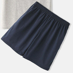 Conjunto de dos piezas unisex de algodón para verano, camiseta de manga corta raglán y pantalones cortos con bloques de color, cuello redondo, informal, transpirable y ligero. - Product Image 3