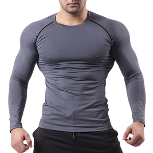 Custom men rash guard pro compression fit OEM polyester breathable quick dry fabric for <b>surfing</b> swimming and training guard - Product Image 1