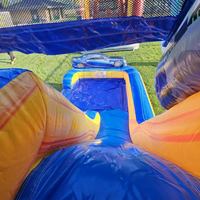 Château gonflable commercial à thème course avec toboggan et piscine, certifié CE, garantie 3 ans, idéal pour les événements et les entreprises