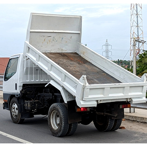 Camión Volquete Mitsubishi Canter 2021 – Excelente Estado de Funcionamiento, Usado, Estándar, 199HP, Motor Diésel, Transmisión Manual, Volante a la Izquierda - Product Image 1