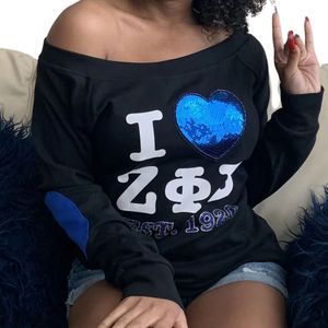 Zeta Phi Beta Off Shoulder Shirt Women Black Long Sleeve <b>Sequin</b> Heart Graphic Casual Sorority Stylish Fashion <b>Top</b> - Product Image 1