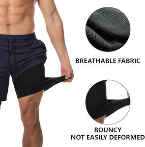 กางเกงขาสั้นสองชั้นแฟชั่นผู้ชาย ดีไซน์พิมพ์ลายตามสั่ง ผ้าโพลีเอสเตอร์ผสมสแปนเด็กซ์ สวมใส่สบาย ลายเรียบ บริการ OEM - Product Image 4