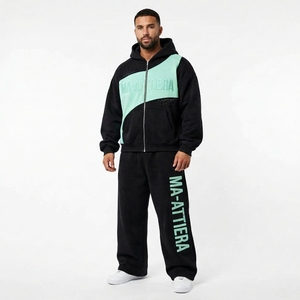 Ensemble survêtement streetwear pour homme, noir et vert menthe, avec sweat à capuche zippé et pantalon large, empiècements colorblock et détails strass, personnalisable OEM ODM - Product Image 1