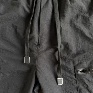 Pantalones cortos Cargo de ajuste holgado para hombre estilo Hip Hop 100% poliéster encaje ecológico patrón sólido ropa informal de moda y deportes de verano - Product Image 4