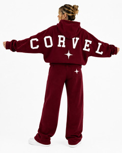 Ensemble d'hiver OEM pour femme : Sweat à capuche oversize noir personnalisé avec imprimé arqué et pantalon de survêtement large en molleton épais - Product Image 4