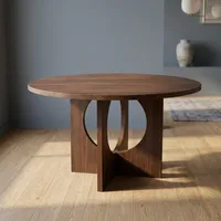 Table basse vintage ronde en bois de noyer foncé avec base à découpes géométriques, meubles de salon de style mid-century modern, pièces d'appoint