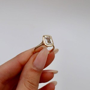 Bold <b>Emerald</b> cut Lab Grown Diamond <b>Ring</b> 3 Carat in bezel Setting with Sleak Polished Band 14k Yellow Gold Statement Design - Product Image 3
