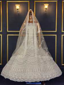 Lehenga choli de mariée best-seller, entièrement brodé, avec de riches détails et une grande traîne élégante pour les occasions spéciales - Product Image 2