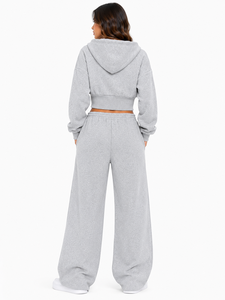 Conjunto de chándal personalizado para mujer con sudadera corta con cremallera frontal, pantalón palazzo de corte relajado, cintura fruncida, joggers oversize y hombros caídos - Product Image 4