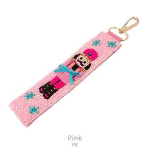 Porte-clés rose en nylon tressé avec motif de poupée, sangle mousqueton, design de Noël de dessin animé, rectangulaire, durable, style Noël dessin animé - Product Image 1