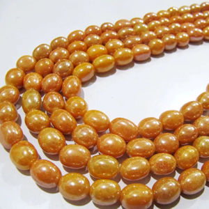 Perles ovales lisses et polies en quartz teinté saphir jaune mystique - Product Image 1
