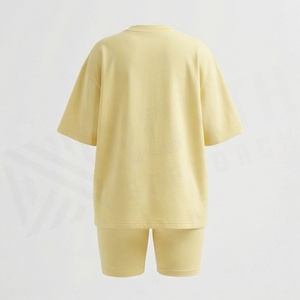 Nouvel ensemble 2 pièces pour femme, t-shirt ample à manches courtes et short au-dessus du genou, décontracté, printemps-été, jaune, en coton - Product Image 2
