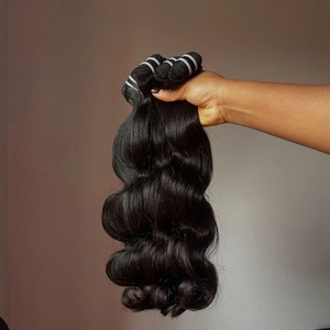 ผมต่อแบบธรรมชาติ ยี่ห้อ Natural Wholesale Bundles สีดำธรรมชาติ 100% แบบลอนคลื่นอินเดีย  ชนิด Single Drawn Remy แท้ - Product Image 3