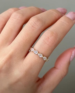 Anillo de boda con diamantes cultivados en laboratorio engastados en bisel, banda de eternidad con corte de pera de oriente a oeste, banda de media eternidad de oro de 14k con bisel de oriente a oeste - Product Image 1