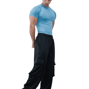 Camisetas de compresión para hombre con tela de alto rendimiento que favorece el movimiento flexible, diseñadas para el movimiento y uso diario. Camisetas de compresión para hombre. - Product Image 1