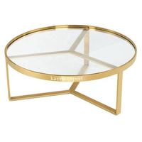 Table basse en métal design, pieds sculpturaux traditionnels, surface polie, mobilier de salon moderne luxueux, plateau en marbre