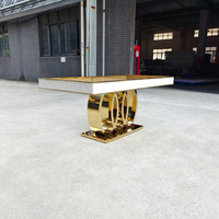 Table à manger ovale en acier inoxydable avec incrustation de nacre et base en anneau doré, console de mariage de luxe