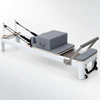Reformer Pilates en aluminium OEM/ODM avec barre de pieds 7 positions et appui-tête réglable – Machine de yoga et Pilates pour cours privés