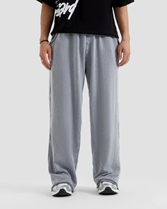 Pantalon de jogging gris ample pour homme, taille élastique, décontracté, avec poches latérales, en coton mi-lourd, imperméable, en molleton écologique - Product Image 1