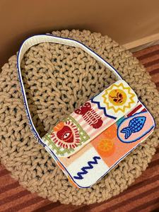 Handmade Rectangular Canvas Handbag With Colorful Embroidered Symbols And Blue <b>Trim</b> - Product Image 2