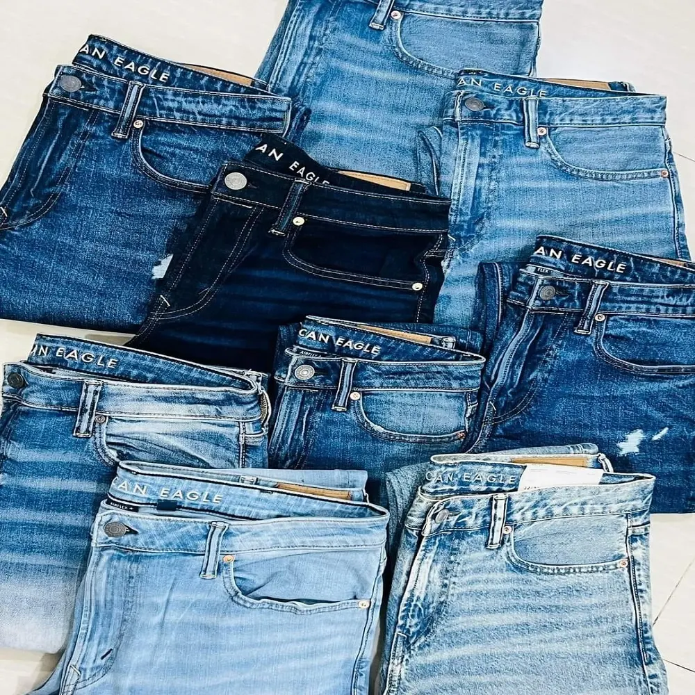 Asli Pria Wanita wanita gadis campuran gaun Denim Jeans celana Surplus pakaian bermerek stok overrun harga grosir