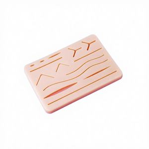 Coussin d'entraînement à la suture manuelle de qualité supérieure à 14 coupures pour les étudiants en médecine/infirmières |   Modèle d'entraînement en silicone durable 7x5 pouces CE - Product Image 1