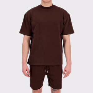 เสื้อยืดคอกลมแขนสั้นผ้าฝ้ายและกางเกงขาสั้นชุดเซ็ตสีชมพูร้อนแรงแบบขายส่งที่สามารถปรับแต่งได้ - Product Image 4
