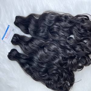 Precio al por mayor Negro Natural Ondulado Trama 100% Vietnamita Mejor calidad Extensiones de cabello crudo muy sedoso sin enredos listo para enviar - Product Image 2