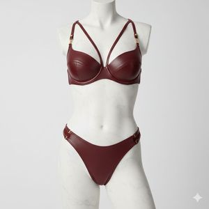 Conjunto de lencería de dos piezas para mujer: sujetador con aros de piel sintética color burdeos y bikini con tiras en Y, copa completa y efecto push-up. - Product Image 1