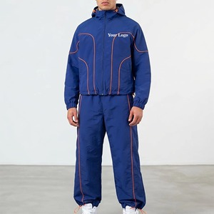 Ensemble de survêtement en nylon avec logo personnalisé OEM, bordure réfléchissante, bleu, coupe ample, décontracté, coupe-vent, pantalon de survêtement pour hommes - Product Image 4