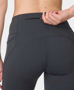 Leggings de sport taille haute noirs en polyester personnalisés pour femmes avec poches et effet ventre plat, idéaux pour le yoga - Vente en gros - Product Image 6