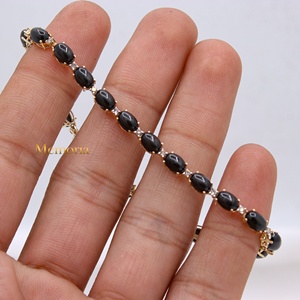 กำไลข้อมือทองคำ 14K ประดับพลอยแบล็คสตาร์ทรงคาโบชองธรรมชาติ |   เครื่องประดับเพชรแบบยูนิเซ็กซ์ ราคาขายส่ง - Product Image 4