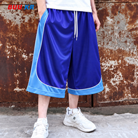 Shorts de basketball brillants personnalisés OEM Buker pour hommes, avec blocs de couleur et passepoil, en maille, style streetwear, shorts longs de sport brillants