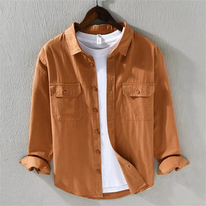 เสื้อเชิ้ตผู้ชายผ้าฝ้าย 100% แบบซาฟารี สีพื้น ไซส์ใหญ่ สไตล์ลำลอง แขนยาว ปกคอพับ ระบายอากาศได้ดี ODM สำหรับฤดูใบไม้ร่วง - Product Image 1