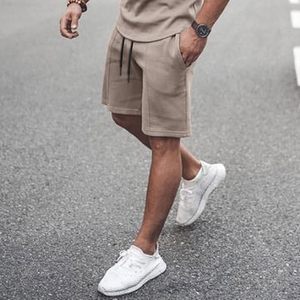 Ensemble t-shirt et short décontracté pour homme en coton tricoté uni à manches courtes, col rond, respirant, pour l'été - Product Image 2