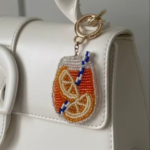 พลอยลูกแพร์ตัดแฟนซีฝาสเตอริ่งสีทองพร้อมจี้เครื่องรางรูปลูกแพร์ - Product Image 1