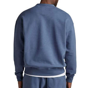 เสื้อสเวตเชิ้ตคอกลมสีน้ำเงินสำหรับผู้ชาย ทรงปกติ สีพื้น ผ้าถักลำลอง แขนยาว ใส่ได้ในฤดูใบไม้ร่วง - Product Image 1