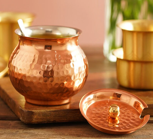 Stunning hammered copper ghee pot comes with a matching lid and a sleek <b>serving</b> <b>spoon</b>. Available at wholesale price. - Product Image 1