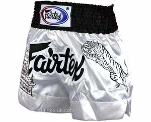 กางเกงมวยไทย Fairtex คุณภาพสูง ปักโลโก้ได้ ทนทาน ใส่ได้ทั้งชายและหญิง สำหรับศิลปะการต่อสู้ ผลิตจากโพลีเอสเตอร์ 100% น้ำหนัก 220 กรัม เหมาะสำหรับออกกำลังกายและชกมวย - Product Image 6